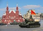 A T-34-85 tank rolling through the Red Square during victory parade on May 9th, check out the road wheels!